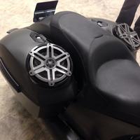 close up of speaker pods installed on saddle bags