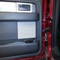 Rear speakers behind factory door panel