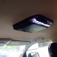 Alpine overhead DVD unit in closed view