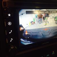 Alpine INE-W940 showing backup camera screen