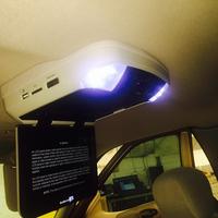 Flip down roof-mount DVD